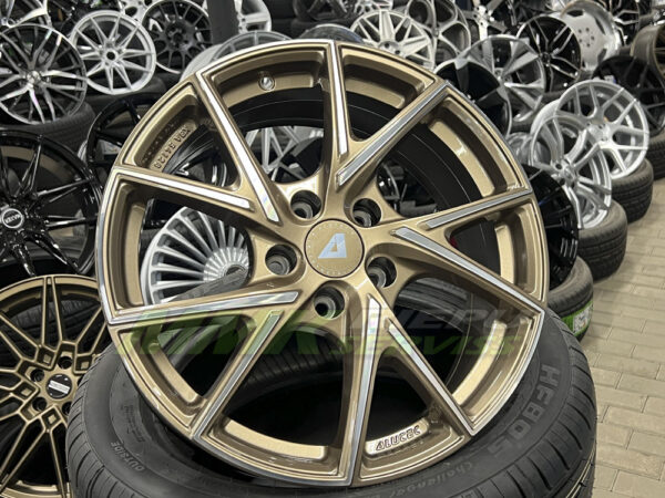 R18x8.5 5X114.3 ET 35 70.1 adx1-858 BRONZA - Aluminija A riepas