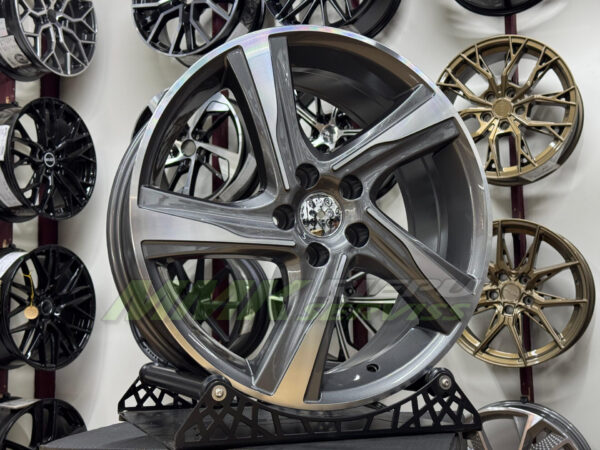 R18X7.5 5X108 ET49 63.3 BY115 Grey Polished (MG) - Aluminija A riepas